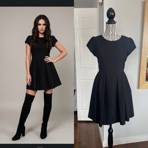 Zara Pleated Fit and Flare Dress. Puff Sleeves and Pockets. Medium. Black